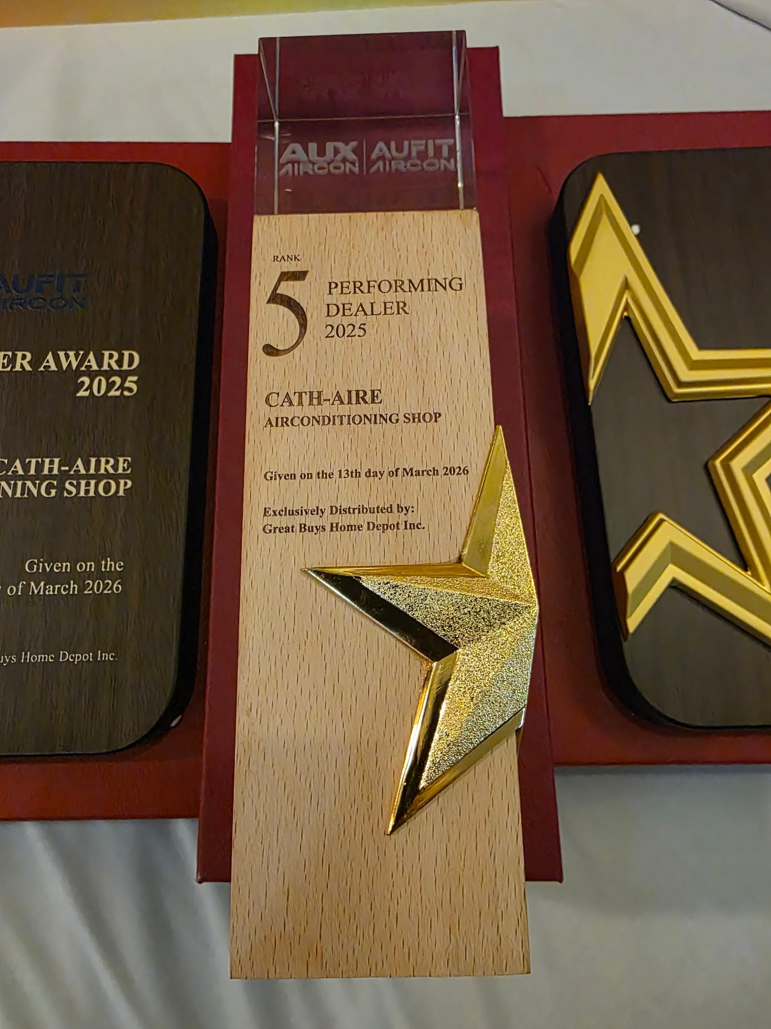 AUX award plaque presented to Cath-Aire Airconditioning Shop for 2025 performing dealer rank 5